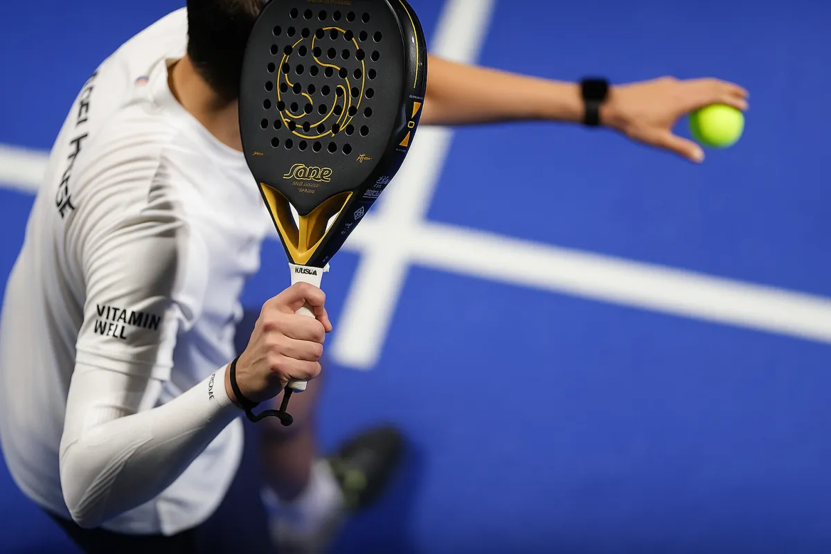 Underhand padel tennis serve